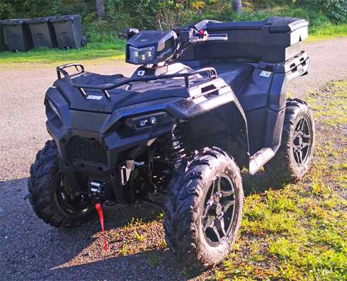 Svart fyrhjuling Polaris Sportsman 570 EPS stulen nordost om Knivsta mellan Uppsala och Stockholm